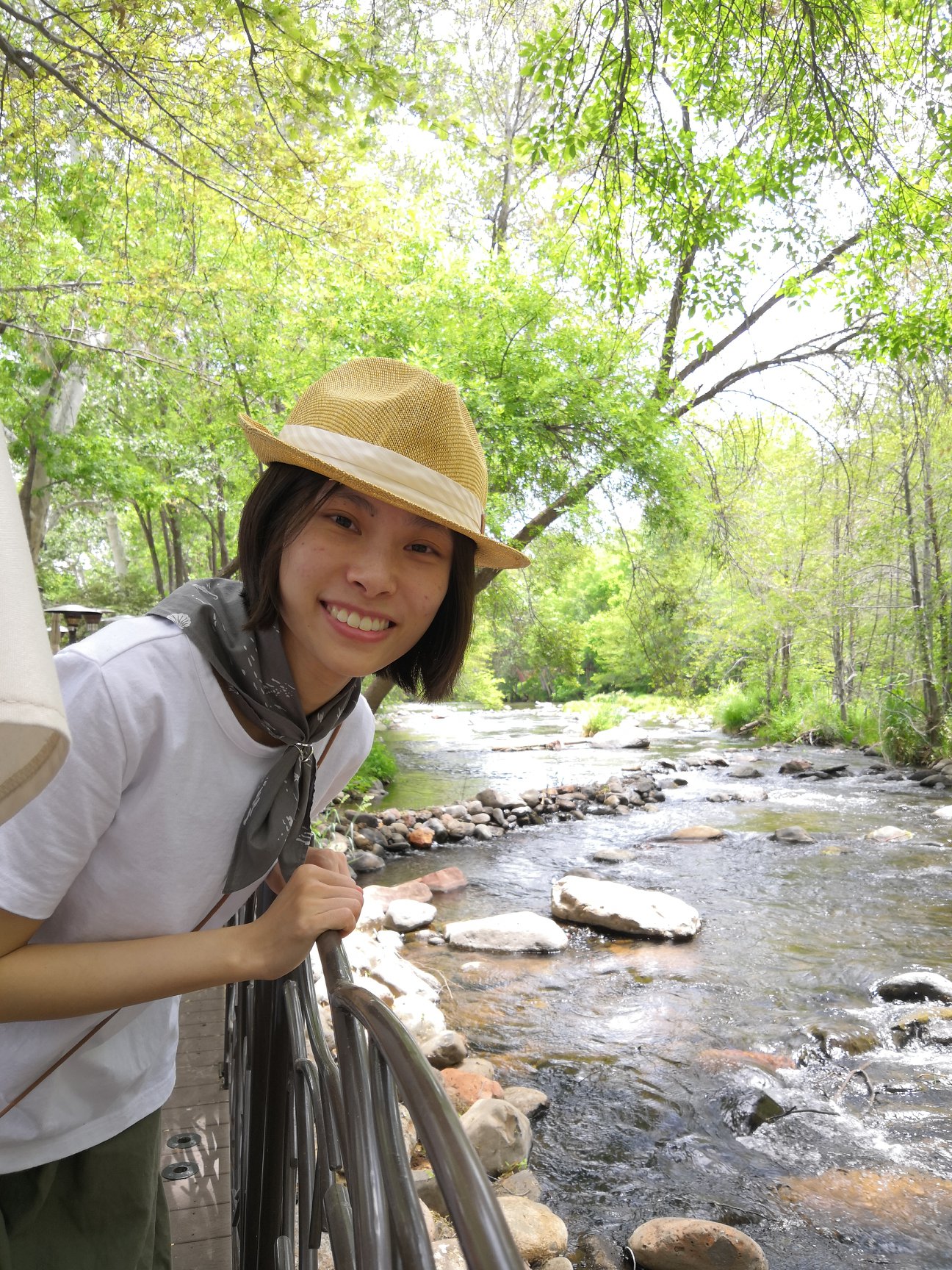 Dr. Chen in front of a river